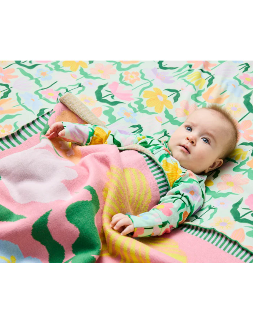 Kip & Co Popping Flowers Green Cotton Knitted Blanket with colorful floral pattern and cozy texture.