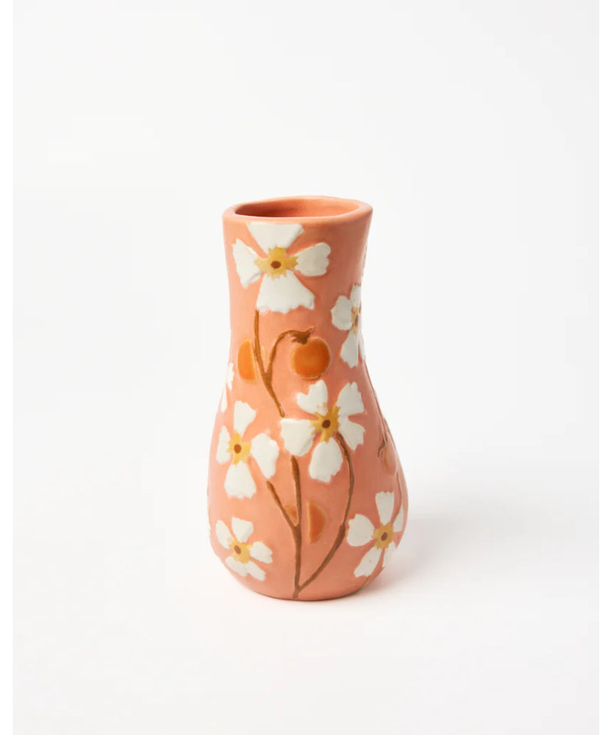 Jones & Co Juniper Vase in peach color, showcasing a smooth ceramic surface and elegant shape suitable for home decor.