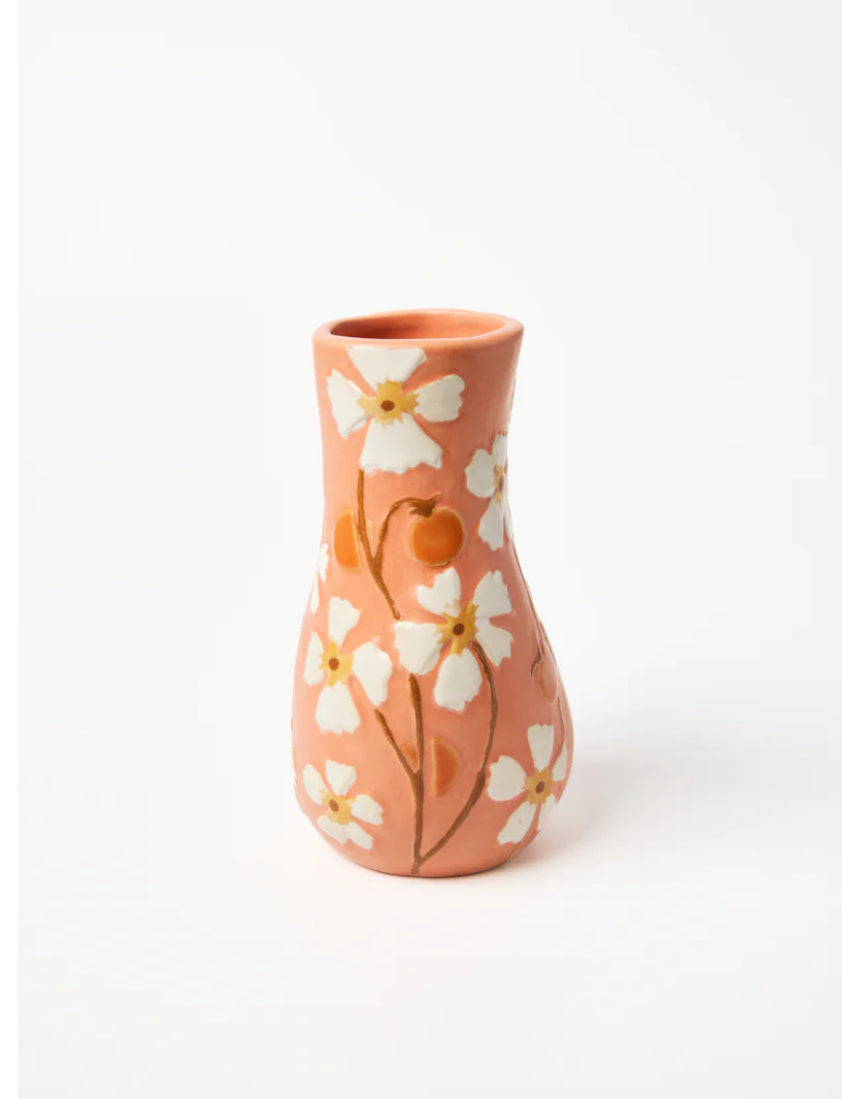 Jones & Co Juniper Vase in peach color, showcasing a smooth ceramic surface and elegant shape suitable for home decor.