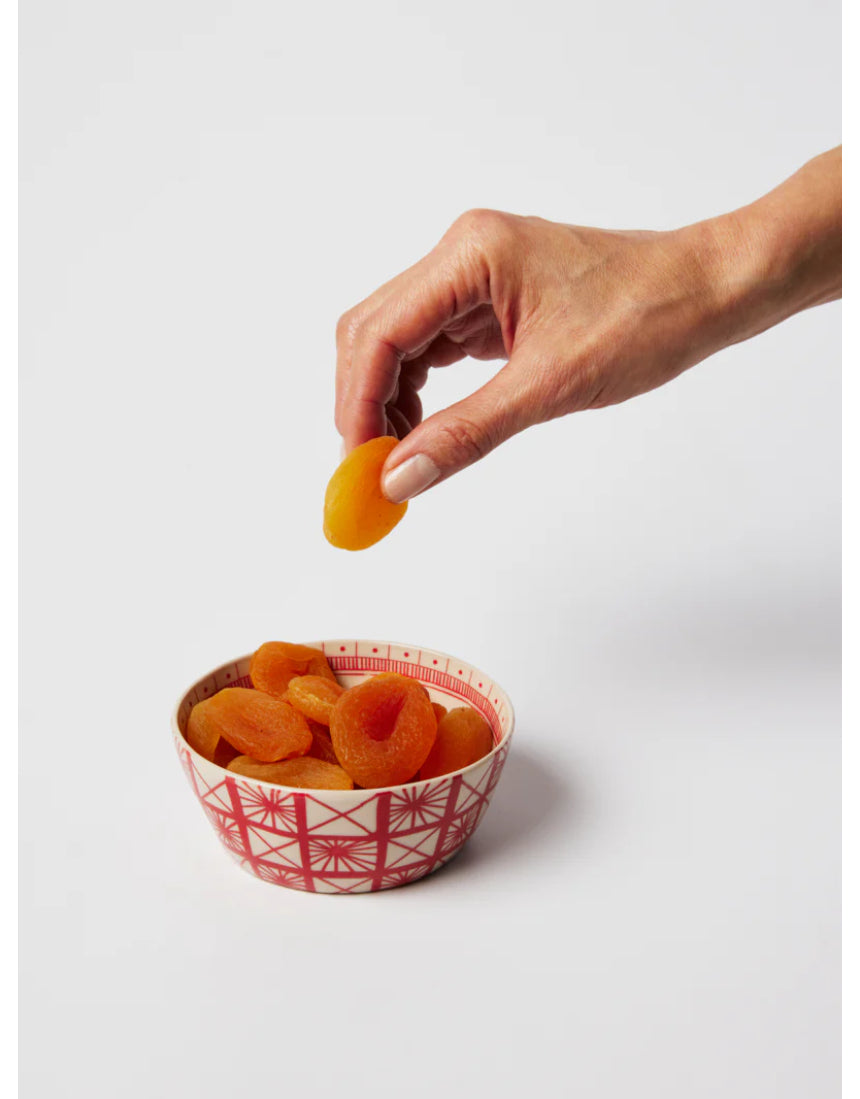Jones & Co Caravan Snack Bowl in Ruby, a vibrant ceramic bowl with a glossy finish, perfect for serving snacks or small treats.