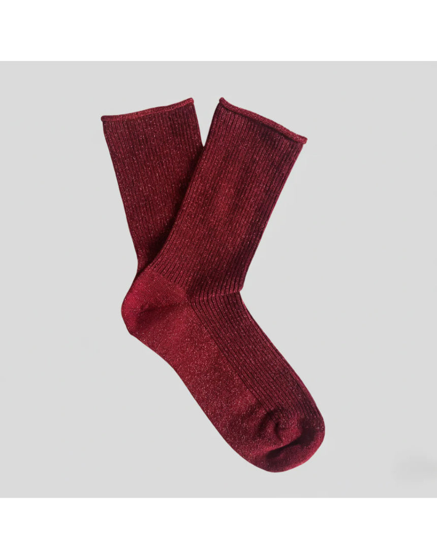 Cherry red Klue glitter lurex socks with a shiny, sparkly finish and ribbed cuffs, perfect for adding a pop of color to your outfit.