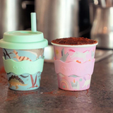 Pink unicorn-themed Chino Club kids' baby chino cup, 4oz, designed for young children, featuring colorful unicorn graphics.