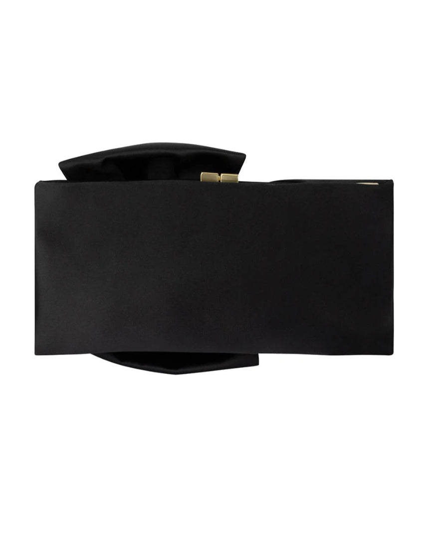 Black Olga Berg Chloe front tie clutch bag with sleek design and elegant front tie detail.