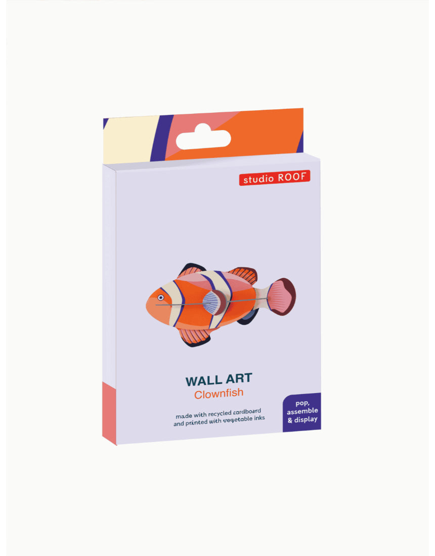 Studio Roof Clownfish wall art decor in packaging, vibrant orange and white clownfish illustration for home decoration.
