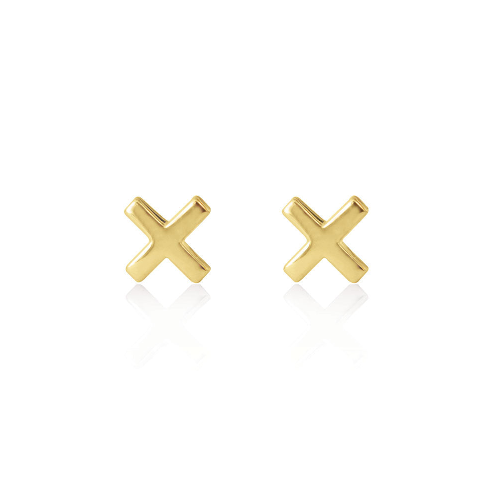 Gold Linda Tahija cross stud earrings featuring small, sleek cross-shaped design on classic stud earrings.