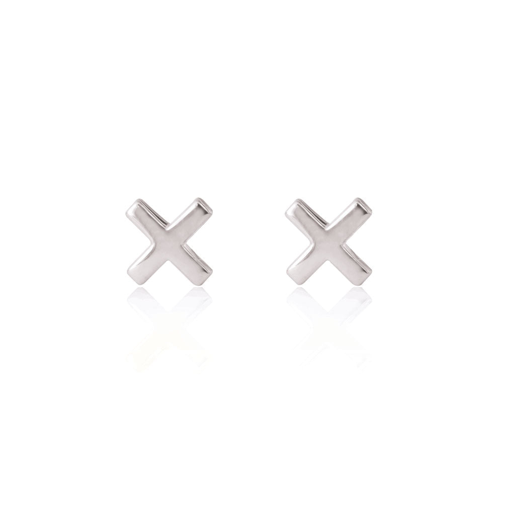 Sterling silver Linda Tahija cross stud earrings featuring small, polished cross designs perfect for everyday wear.