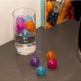 Set of 24 reusable cat ice cubes from isAlbi, with clear plastic molds and frozen water for keeping cats cool.