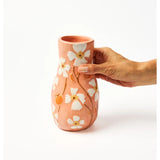 Jones & Co Juniper Vase in peach color, featuring a smooth ceramic surface and elegant shape, ideal for floral arrangements.