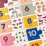 Lauren Sissons Studio Number Puzzle Pairs featuring colorful, interconnected puzzle pieces with numbers for educational play and visual appeal.
