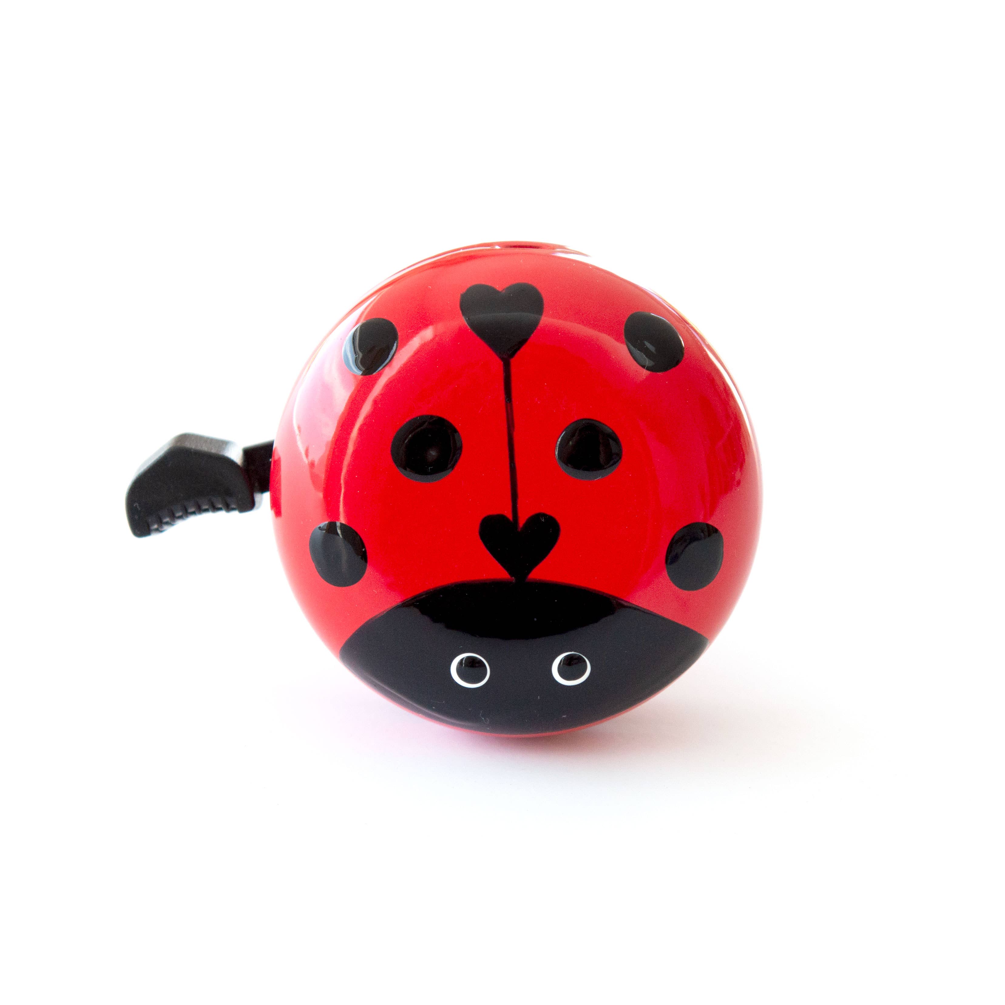Beep Ladybug Bike & Scooter Bell in red, featuring a cute ladybug design, mounted on a bicycle handlebar.