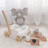 Living Textiles Mason the Elephant knitted toy, soft and plush stuffed animal for children, featuring detailed knitting and gentle colors.