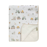 Living Textiles Jersey Sherpa Blanket featuring tractor ride print, soft jersey fabric with cozy sherpa backing, ideal for warm bedding.