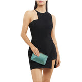 Olga Berg Edith iridescent clutch bag in vibrant green with a sleek, shiny finish and compact design for evening wear.
