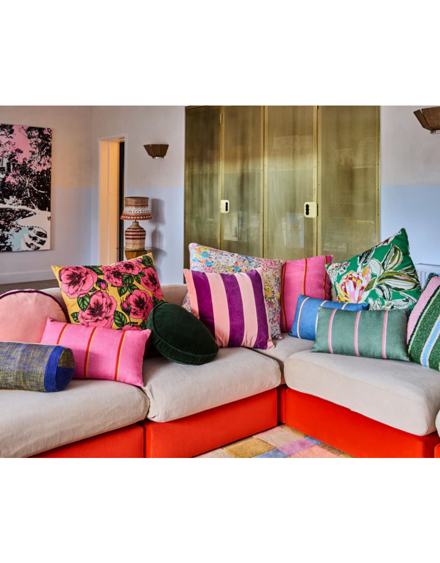 Kip & Co Plum Jam velvet cushion with soft, plush fabric and vibrant color, perfect for adding cozy style to a living space.