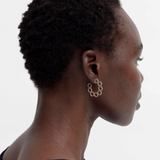 Ecru Tutra earring by Elk, showcasing a delicate accessory with intricate design and elegant craftsmanship.