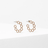 Ecru Tutra earring by Elk, showcasing a stylish accessory with a delicate design and elegant finish.