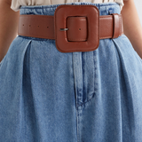 Black Elk Trin belt with adjustable strap and metal buckle, displayed on a neutral background.