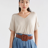 Elk Trin Belt in tan leather, featuring a sleek design and adjustable sizing, ideal for casual or formal wear.