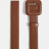 Elk Trin belt in tan leather with adjustable buckle, shown in size XS/S, featuring a sleek and stylish design.