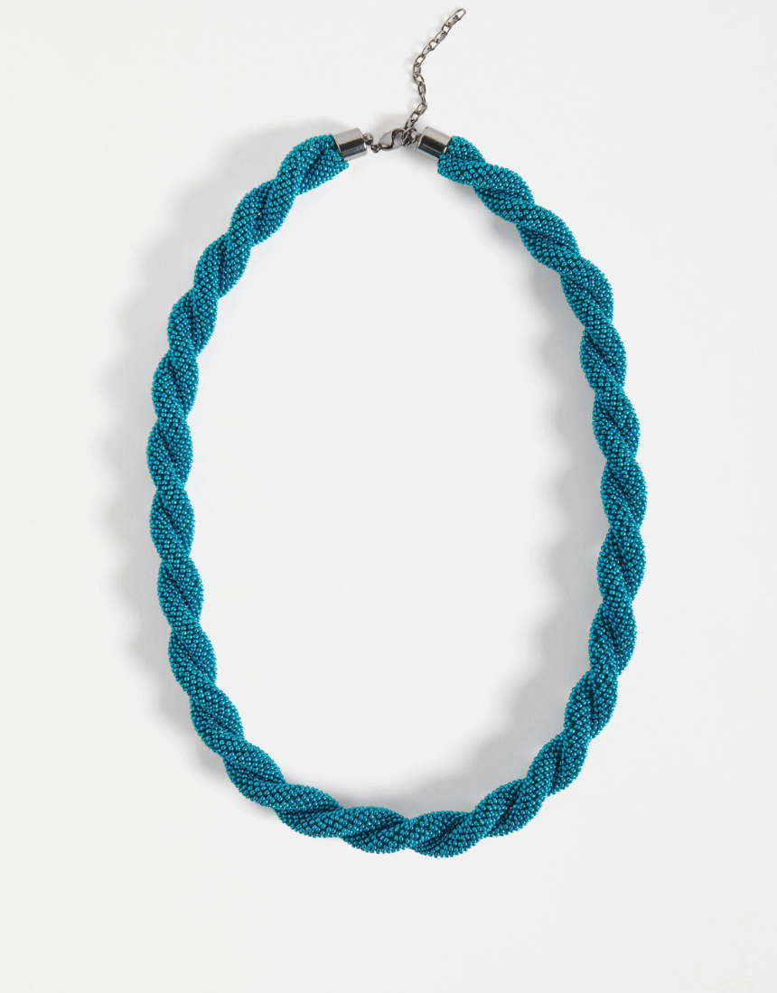 Elk Kolle Necklace in teal with a sleek, minimalist design, featuring a smooth, curved pendant on a delicate chain.