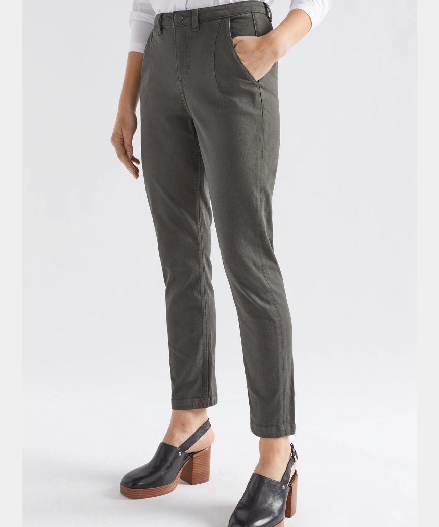Olive green Elk Mysa Jean casual pants with relaxed fit and belt loops, shown on a model.