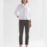 Olive green Elk Mysa Jean displayed on a hanger, showcasing the casual denim style and slim fit design.