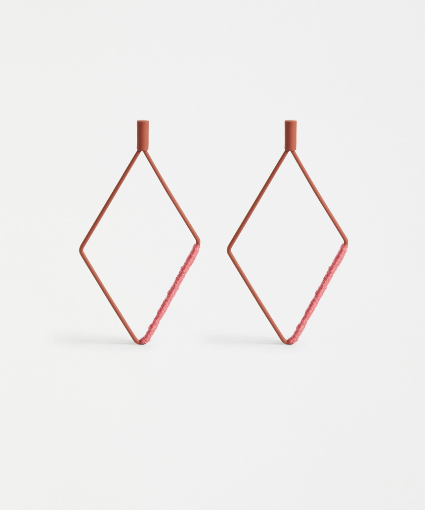 Elk Nett Drop Earrings in copper with delicate, layered design and hook-style clasps, hanging gracefully from the ears.