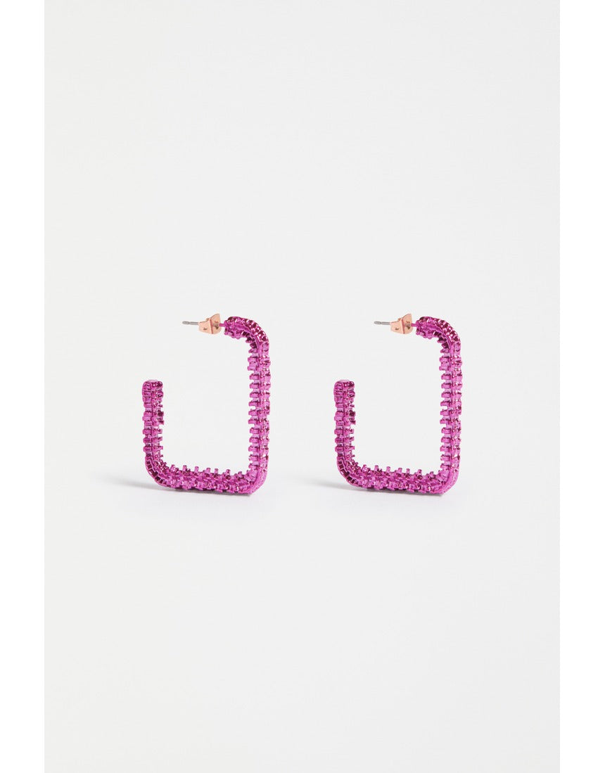 ELK The Label Hiva large hoop earrings in vibrant fuchsia, featuring bold circular design and smooth finish.