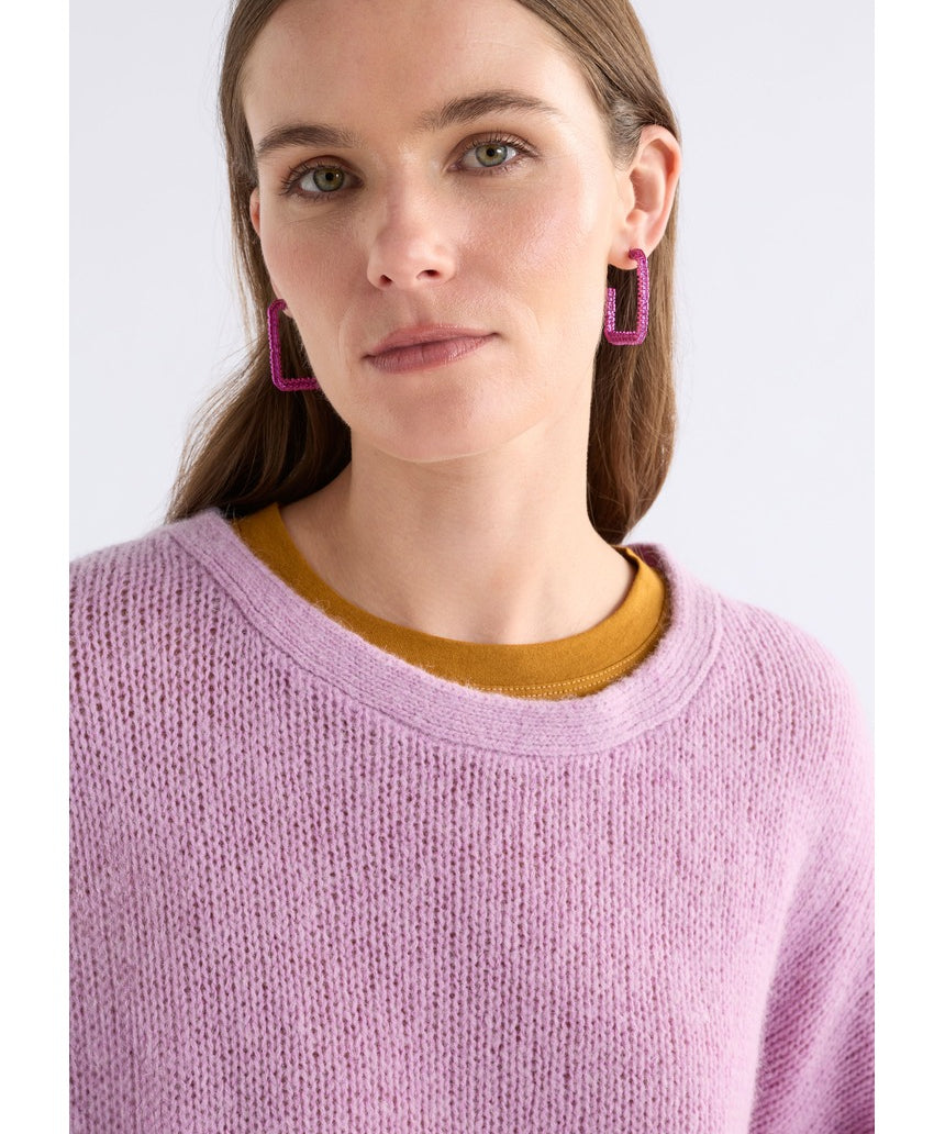 ELK The Label Hiva large hoop earrings in vibrant fuchsia, featuring bold circular design with a glossy finish.
