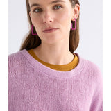 ELK The Label Hiva large hoop earrings in vibrant fuchsia, featuring bold circular design with a glossy finish.