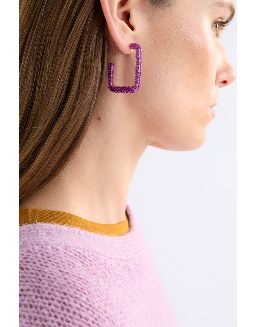 Fuchsia large hoop earrings from ELK The Label's Hiva collection, featuring bold, round design with a vibrant color.