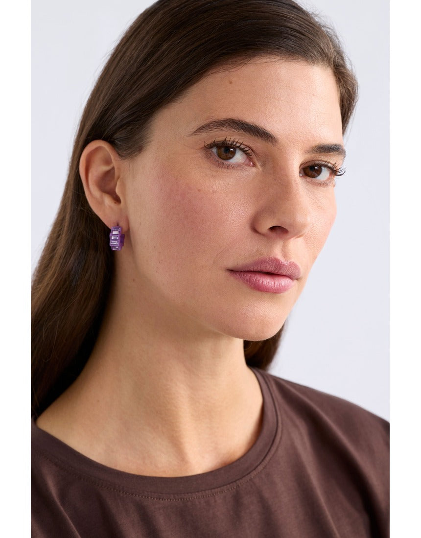 Violet Elk Jolle Mini Hoop Earring by ELK The Label, small gold hoop with violet enamel detail, on a neutral background.