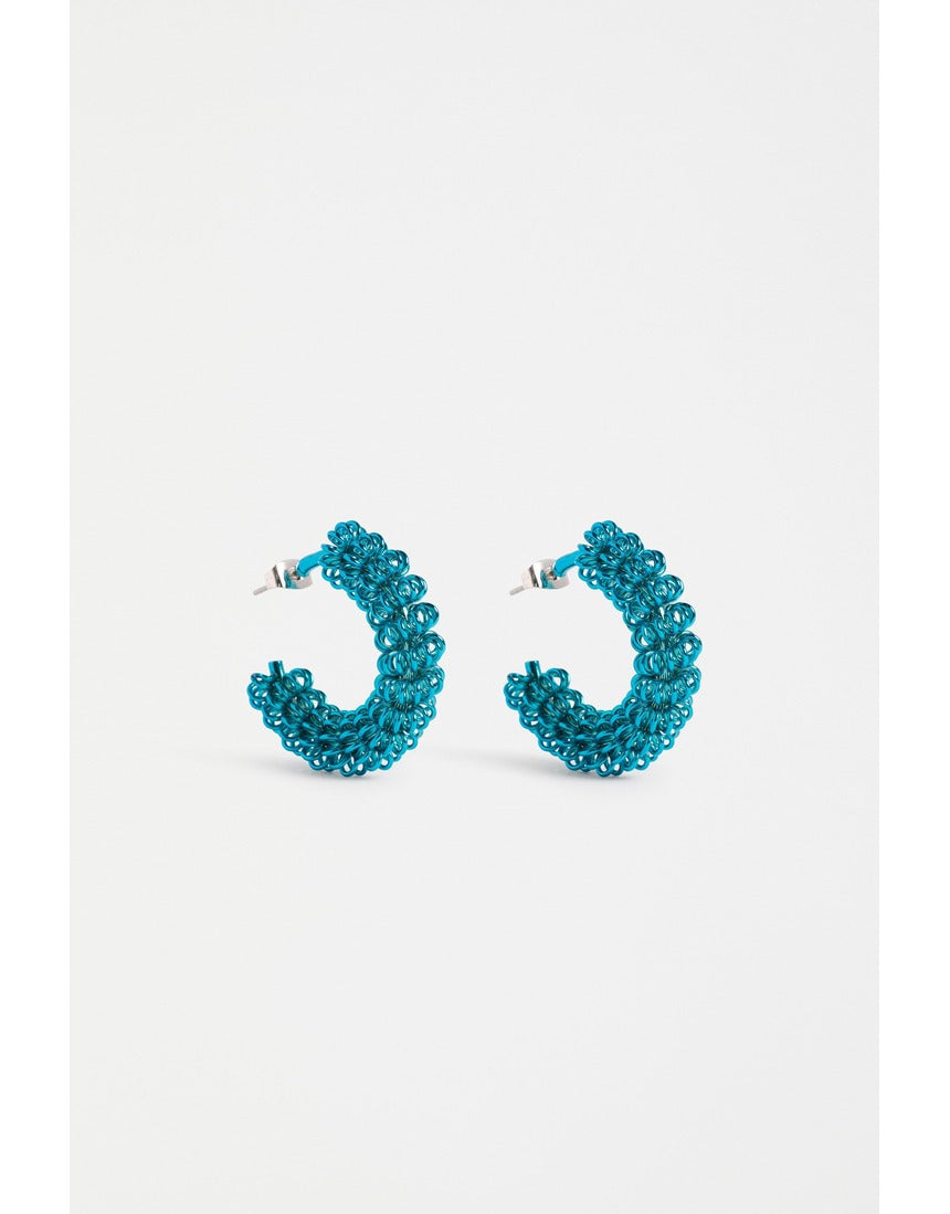 ELK The Label Klippan hoop earring in dark teal, featuring a sleek, circular design with a modern, minimalist style.