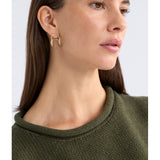 Gold Elk Orden Hoop Earring by ELK The Label, featuring a sleek circular design and polished finish.