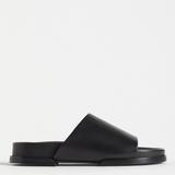 Black Elk Etin Slide shoes featuring a sleek design and comfortable slip-on style for casual wear.