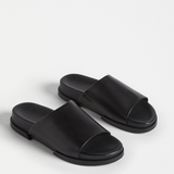 Black Elk Etin Slide shoes featuring a sleek design, perfect for casual wear and easy to slip on.