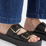 Black Elk Turi Platform Shoes with chunky soles and sleek design, showcasing modern footwear style.