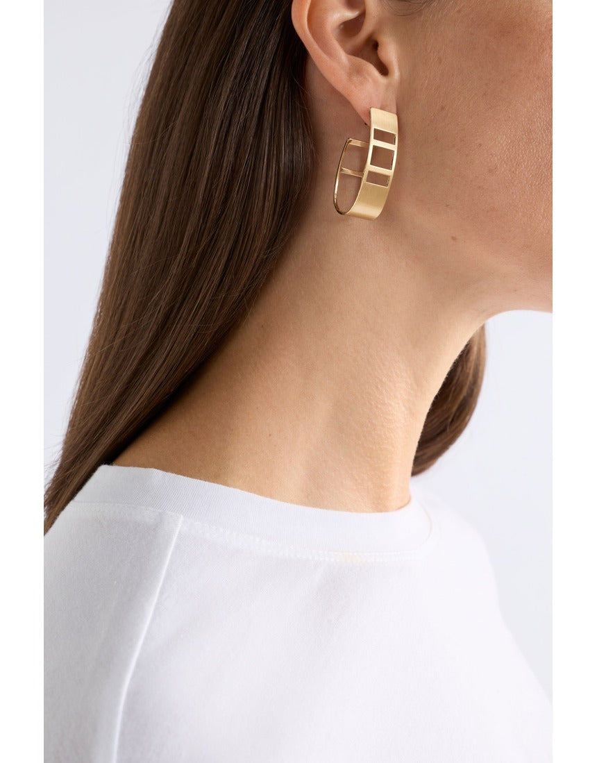 Gold Elk Skeni earrings by ELK The Label, featuring minimalist design and sleek gold finish for elegant everyday wear.