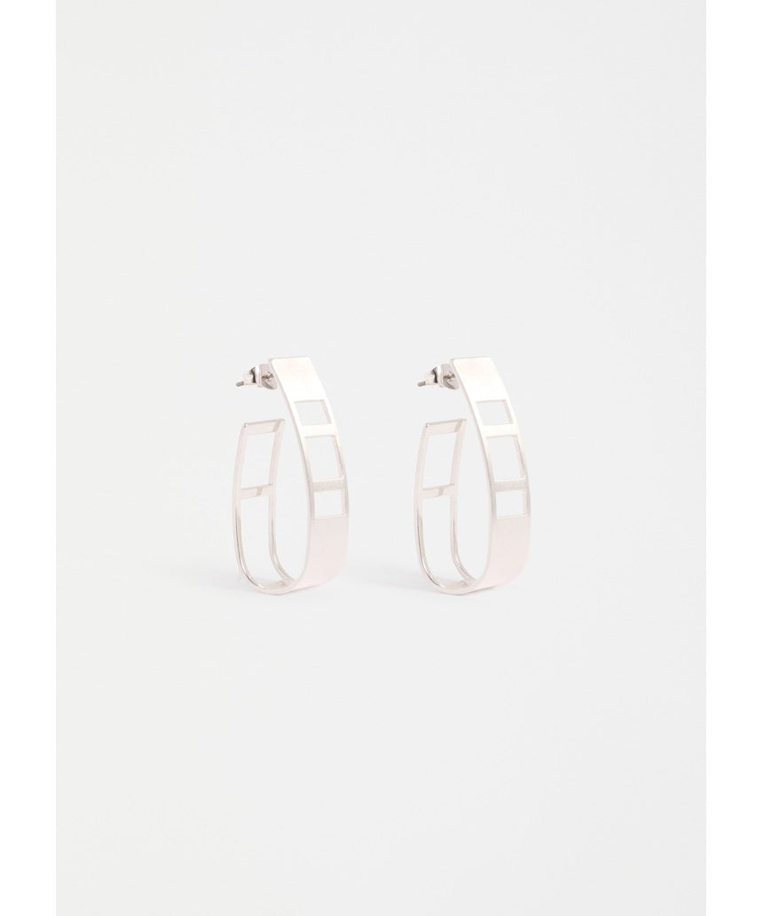 Silver Elk Skeni Earring by ELK The Label featuring a sleek, modern design with smooth silver finish and minimalist style.