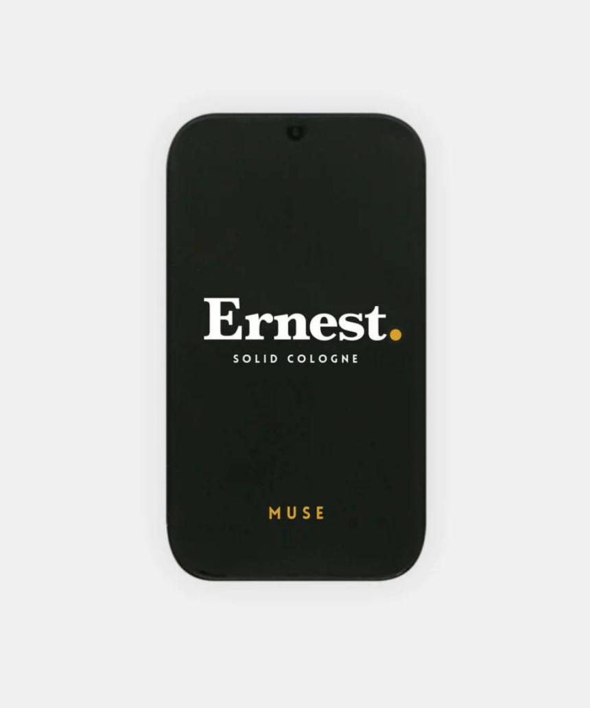 Ernest Muse Solid Cologne in a compact container, featuring a sleek design and the brand’s minimalist style.