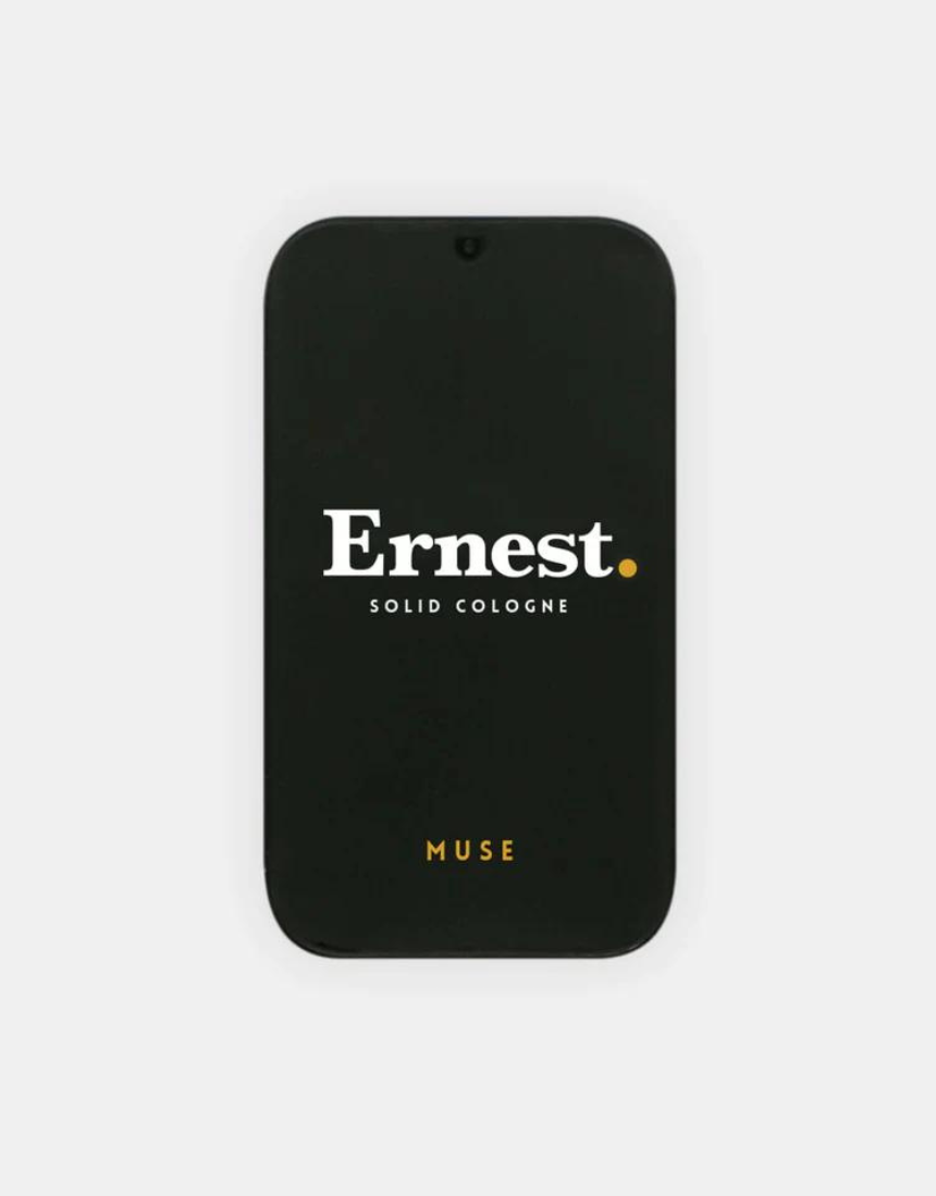 Ernest Muse Solid Cologne in a compact container, featuring a sleek design and the brand’s minimalist style.