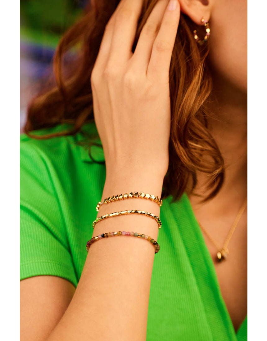 Estella Bartlett Coco & Tourmaline bracelet featuring a delicate chain with colorful gemstone accents.