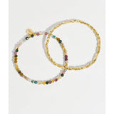 Estella Bartlett Coco & Tourmaline bracelet featuring colorful beads and delicate design on a white background.