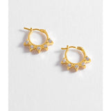 Estella Bartlett CZ spike hoop earring with sparkling cubic zirconia stones and a sleek gold finish.