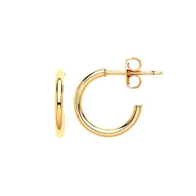 Estella Bartlett gold-plated small hoop earrings showcasing a sleek, minimalist jewelry design on a white background.