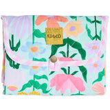 Kip & Co Popping Flowers Green baby change mat with vibrant floral pattern and soft padded surface for comfortable diaper changes.