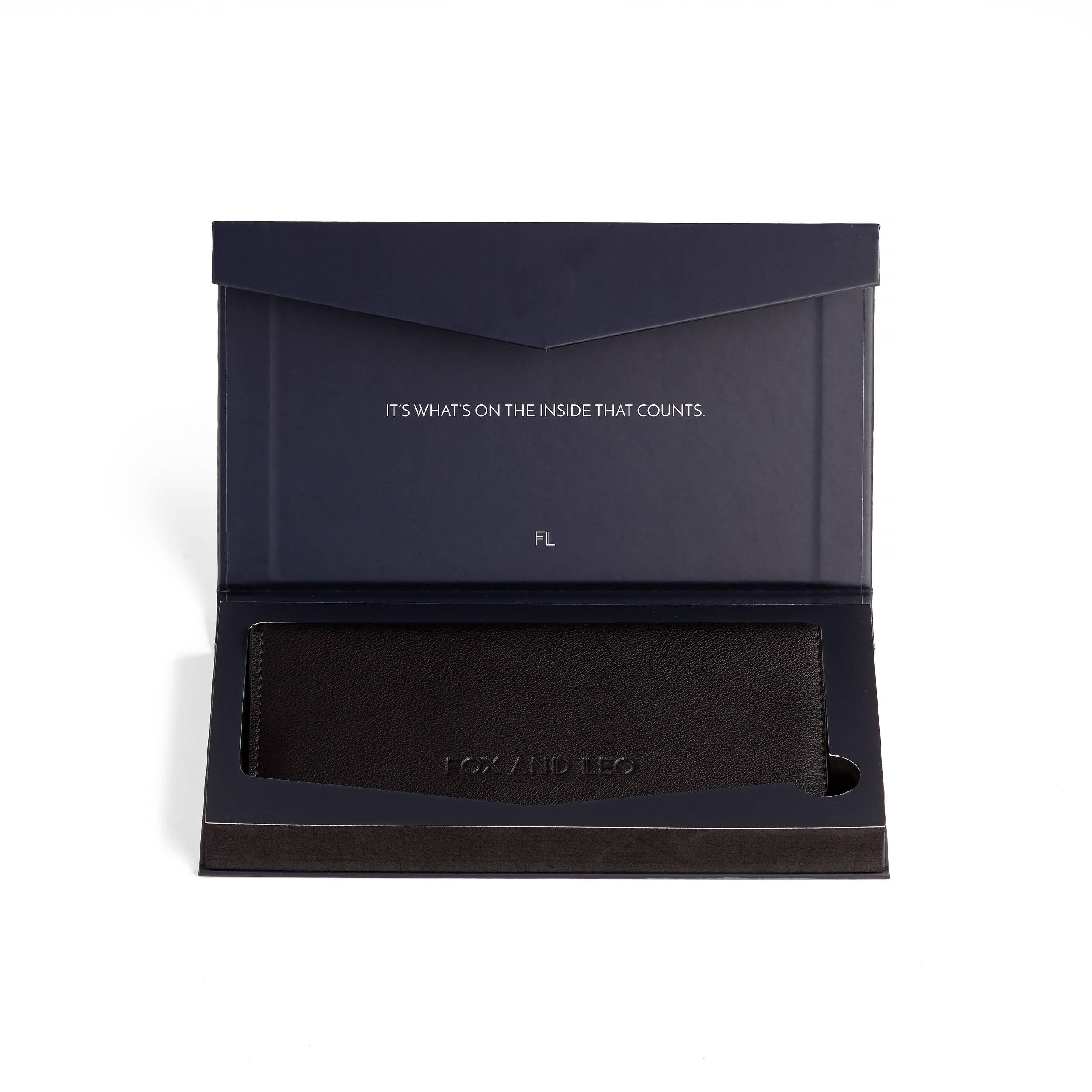 Black Fox & Leo Swallet wallet with sleek leather design and minimal branding, placed on a neutral background.