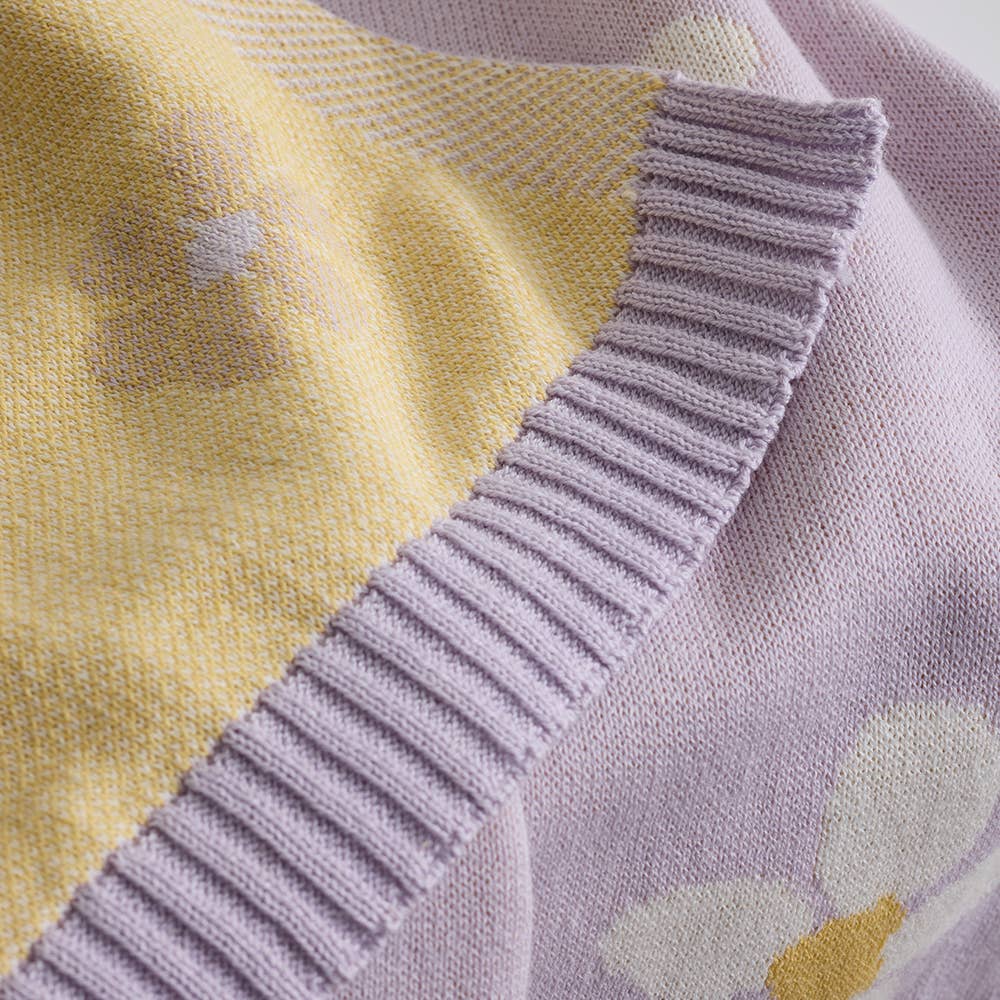 Living Textiles Lilac Daisy Dreams pram knitted blanket with floral pattern, soft and cozy for baby strollers and bassinets.