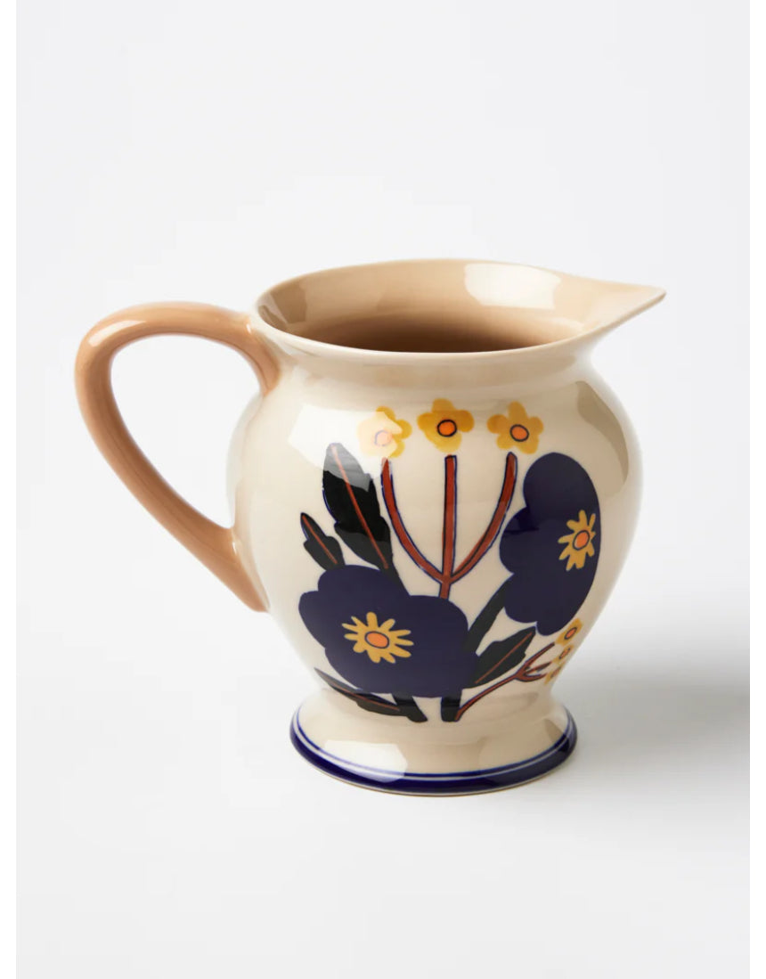 Jones & Co blue bloom pitcher vase with floral design, ceramic container for flowers and decorative displays.