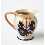 Jones & Co blue bloom pitcher vase with floral design, ceramic container for flowers and decorative displays.